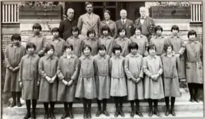 Historical photograph of children outside the Mohawk Institute Indian Residential School ("The Mush Hole"). Image courtesy of the London Metropolitan Archives.