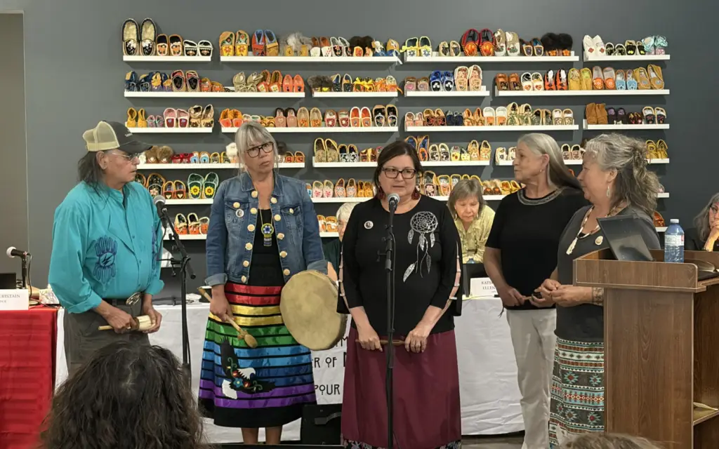 Mohawk Institute Survivors and wellness supports sharing a song at the 57th Session of the Permanent Peoples’ Tribunal in Montreal, May 2026.
