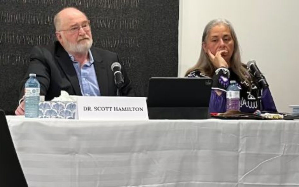 Dr. Scott Hamilton (left) and Laura Arndt testify at the Permanent Peoples’ Tribunal on Missing and Disappeared Indigenous Children and Unmarked Graves in Canada, held in Montreal in May 2026.